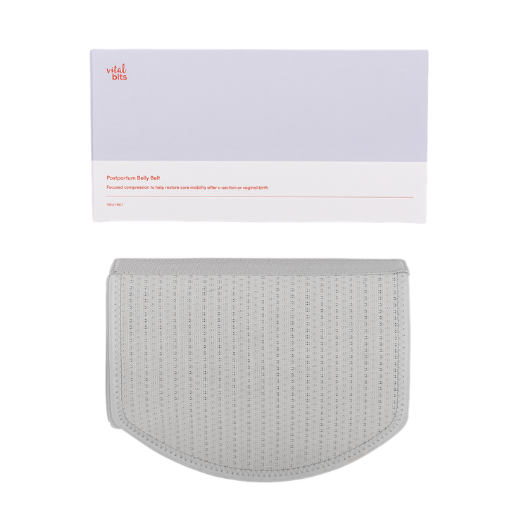 Grey abdominal support binder with its branded box labelled 'vital bits' 