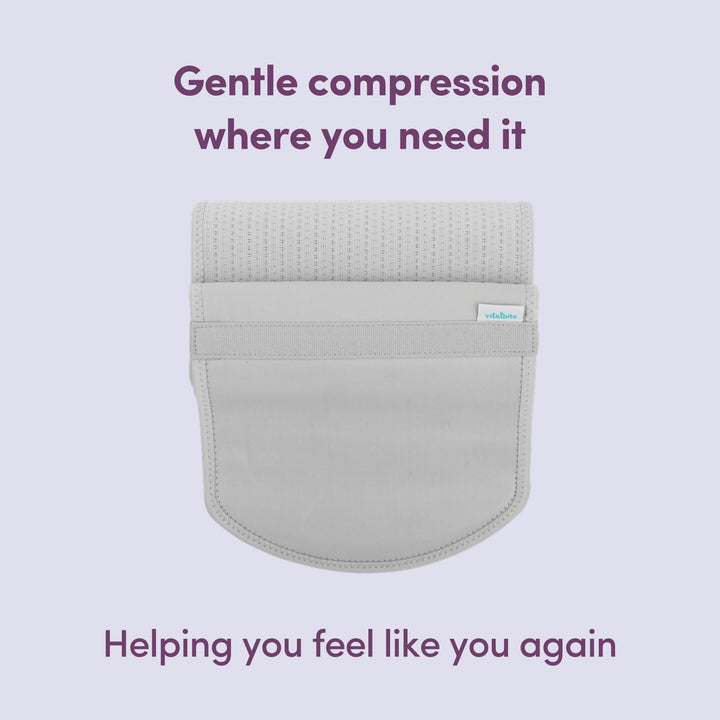 Grey abdominal support binder with text on a light purple background