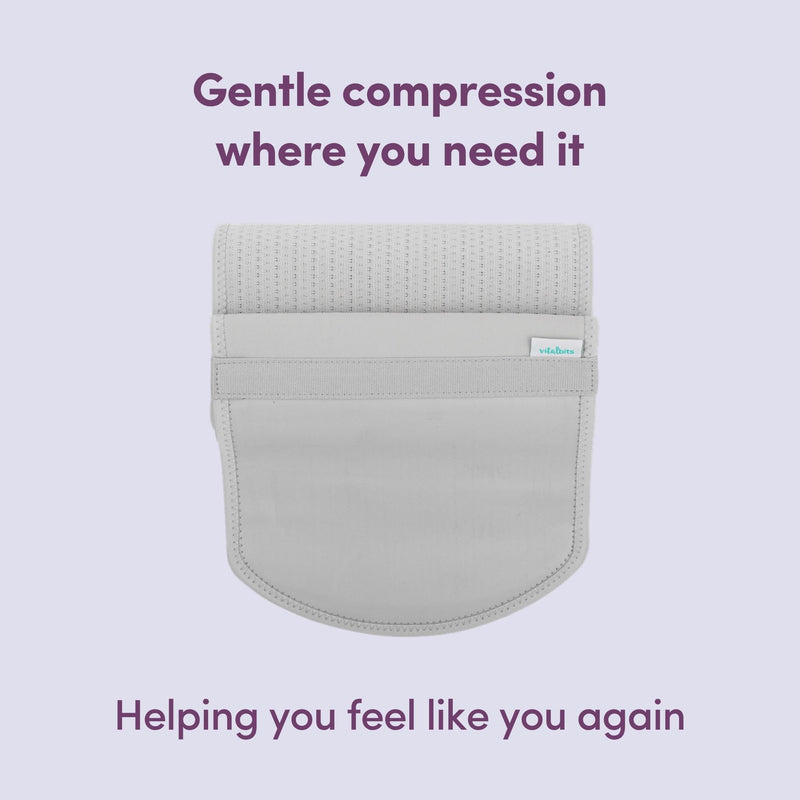 Grey abdominal support binder with text on a light purple background