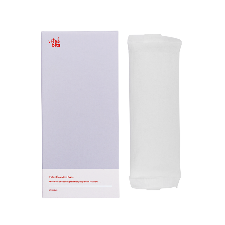 An unpackaged instant ice maxi pad, next to its box with a clear background