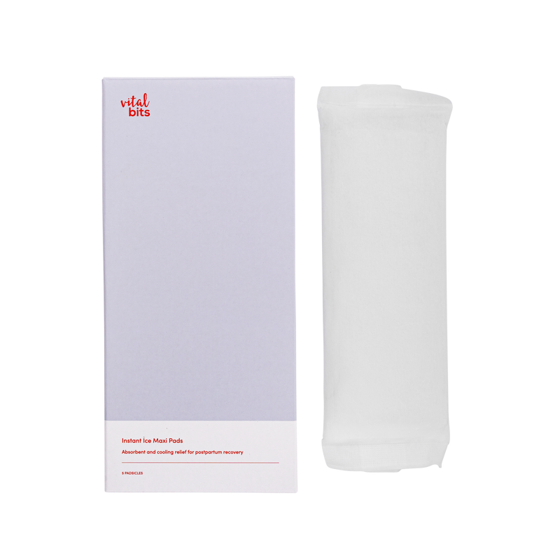 An unpackaged instant ice maxi pad, next to its box with a clear background