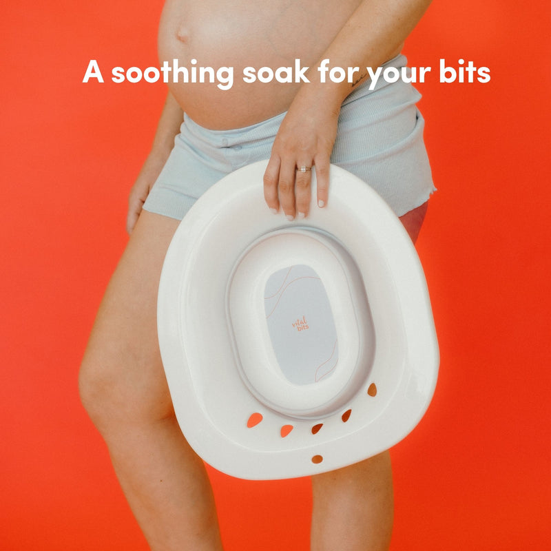 A woman holding a Vital Bits Sitz Bath on an orange background with text 'A soothing soak for your bits'.